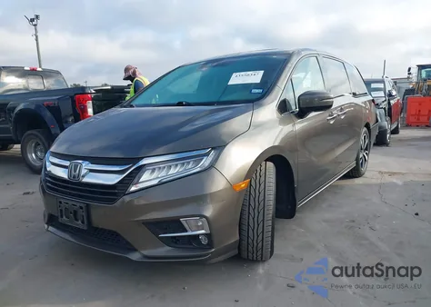 2018 Honda Odyssey Elite z USA, uszkodzony, nr VIN 5FNRL6H99JB032548